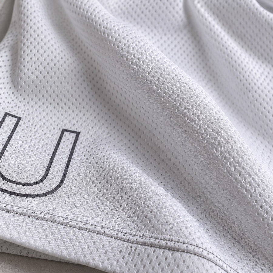 Gros plan sur le tissu du short Blue Lock Ubers